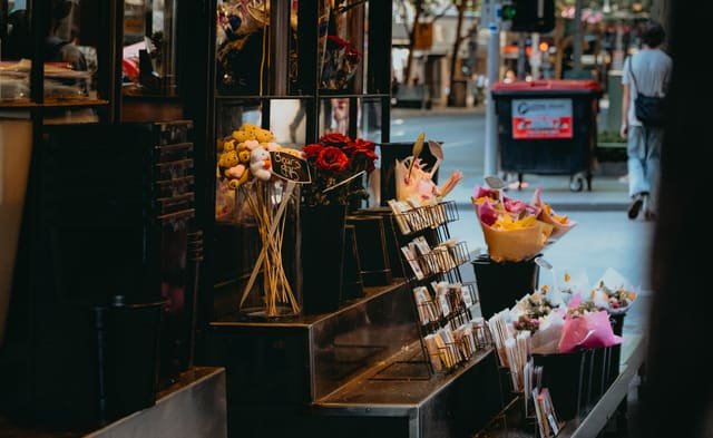 The Flower Stall on a wall above a sofa